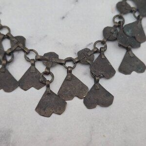 ANTIQUE BOOK PIECE ARTICULATED PRIMITIVE CUT OUT HEARTS NECKLACE